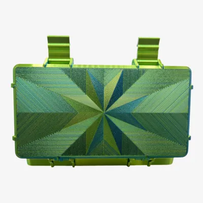 Green and blue starburst-lid 50-count vial box, closed